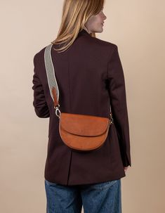 Ava in Cognac Classic Leather. Model Image_1 Crossbody Saddle Bag, New York Street Style, Sustainable Leather, Antique Brass Hardware, New York Street, Gorgeous Bags, Classic Leather, Perfect Bag, Classic Collection