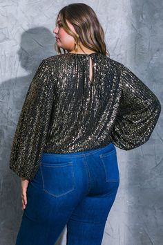 A sequin top featuring round neckline, long sleeve, elasticized waist and back neck button closure. Perfect for my plus size girly wanting a trendy options . Glamorous Long Sleeve Tops With Contrast Sequin, Glamorous Fall Top With Contrast Sequin, Glamorous Fall Tops With Contrast Sequin, Glamorous Contrast Sequin Top For Fall, Long Sleeve Tops With Contrast Sequin For Night Out, Contrast Sequin Long Sleeve Tops For Night Out, Stretch Long Sleeve Crew Neck Top For Party, Glamorous Long Sleeve Sequin Blouse, Glamorous Fall Blouse With Contrast Sequin