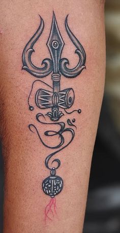 New Tattoos 2023, Rudraksha Tattoo, Trendy Tattoo Ideas, Hindu Tattoos, Nails 2023 Pedicure, Hanuman Tattoo, Trishul Tattoo Designs, Trishul Tattoo, Tattoos 2023