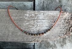 ✦Delicate and eye catching, gorgeous Czech glass matte beads in opaque various autumn tones, single short strand necklace. The 15 main beads are capped and separated with tiny 2mm brass round beads and tiny terracotta seed beads at back of necklace, finished with clasp and extension chain. This necklace is a delight. ✦Bead size vary from 7mm to 6mm. Seed beads at back 2mm. ✦Length of necklace 42cm (161/2") approximately, plus a 6cm (2 1/2") extension chain. ✦ Also there is a matching earrings op Bohemian Everyday Necklaces With Spacer Beads, Czech Glass Necklace, Autumn Tones, Mother Necklace, Earth Mother, Hippie Necklace, Mothers Necklace, Bohemian Necklace, Necklace Simple