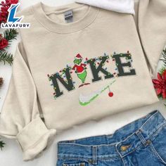 Merry Christmas Grinch Christmas Snow Vintage Grinch Christmas Embroidered Shirt An embroidered sweatshirt is a cozy and stylish piece of clothing, typically made from soft cotton or fleece. It features intricate embroidered designs, adding a personal and artistic touch. These designs can range from simple logos or text to more detailed patterns, making each sweatshirt unique. Perfect for casual wear, embroidered sweatshirts combine comfort with a creative flair, suitable for everyday use or as Vintage Grinch, Nike Christmas, Christmas Sweatshirt Ideas, Preppy Christmas, Cute Shirt Designs, School Looks, Grinch Christmas, Christmas Snow, Snowman Christmas