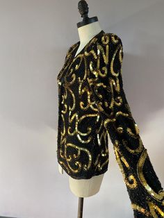 Vintage handmade sequined evening jacket by Stenay. Made in India. 100% silk. Size S. Excellent condition. There are hidden hooks all the way down the front to wear it closed. Silk Sequined Long Sleeve Outerwear, Silk Winter Party Outerwear, Silk Outerwear For Party In Winter, Silk Outerwear For Fall Parties, Silk Party Outerwear For Fall, Evening Jacket, Victorian Lady, Evening Jackets, Way Down