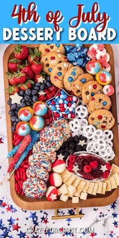 the 4th of july dessert board is full of cookies, fruit and other patriotic treats