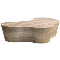 a large wooden object with wavy lines on it's sides, sitting in front of a white background