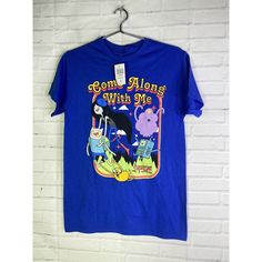 a blue t - shirt with an image of adventure time on it