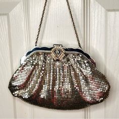 Excellent Condition! Vintage Small Whiting & Davis 1920’s - 30’s Metallic Silver Hand Or Metal Clutch Bag, Includes Original Vintage Ladies Pocket Mirror And A Beautiful Cluster Front Piece Of Different Colored Crystals! It Has Some Wearing Stains On The Inside, Which Makes It Look And Gives Off A Total Touch Of Vintage Beauty! If You’re A Vintage Collector Or Vintage Junky As I Am! This Is An Amazing Piece To Have! Everything I Described Is Shown On Pictures! Classic Silver Evening Bag For Formal Occasions, Classic Silver Evening Bag For Formal Events, Classic Silver Rectangular Evening Bag, Vintage Clutch For Events, Luxury Silver Bags For Cocktail, Rectangular Silver Bag For Cocktail, Vintage Clutch Bag For Events, Elegant Silver Evening Bag For Vintage Events, Antique Silver Bag For Party