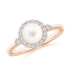 a pearl and diamond ring in rose gold