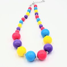 "Great accessory for your lil star, who loves to play dress up. Great for photos or to make her feel snazzy! This would be a perfect gift to make her smile. Necklace is made with 20 mm solid \"bubblegum\" chunky beads and is about 9\" inches long. The spacer beads, lobster clasp, and 3\" inch extension are silver tone. ~WARNING~ All jewelry items are not intended as toys or food. Product parts can be a choking /strangling hazard and as such are not suitable for children under 3 years of age. Do Cute Multicolor Plastic Necklaces, Multicolor Beaded Plastic Necklace, Cute Handmade Plastic Necklace, Plastic Round Beads Necklace For Gift, Playful Colorful Jewelry For Birthday, Fun Multicolor Plastic Necklace, Cute Multicolor Necklace For Birthday, Colorful Playful Birthday Jewelry, Playful Plastic Jewelry For Birthday