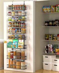 an organized pantry in the corner of a room with two bins and one door open