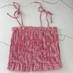 Ripped The Tags Off And Never Wore. Super Comfy And Stretchy Material. Shoulders Tie At The Top. Bought At Dillards Gingham Ruffle Tops For Vacation, Gingham Ruffled Tops For Vacation, Summer Plaid Top For Beach, Red Sleeveless Top For Picnic, Cotton Gingham Tops For Vacation, Red Summer Tops For Picnic, Trendy Red Tops For Picnic, Country Cowgirl, Tube Top