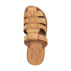 The Michael Pacific Slide is a stylish sandal-inspired footwear in the softest Camel Brown Nubuck full-grain leather, which is perfect for adding flair and comfort to your wardrobe. Premium top-quality leather offers exceptional comfort and durability. The unique leather upper sole molds to your feet for a personalized fit, and the robust polyurethane outsole ensures all-day wear. Enjoy these closed-toe sandals in any environment, from city to beach. Handcrafted in East Jerusalem using 100% natu Spring Camel Leather Sandals, Beige Leather Sandals With Rubber Sole, Casual Suede Sandals With Leather Lining, Natural Leather Open Heel Sandals, Natural Leather Sandals With Open Heel, Beige Leather Sandals With Leather Lining, Brown Suede Sandals With Single Toe Strap, Beige Leather Sandals With Leather Footbed, Casual Light Brown Leather Sandals