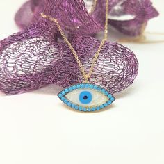 -The Lucky Evil Eye with Mother-of-pearl design style women jewelry pendant is made with high-quality 14K solid gold. (Evil Eyes are also called Turkish or Greek Evil Eye, Faith Protection and Nazar ) - We have listed many kind of evil eye jewelries. You can check out https://www.etsy.com/shop/LatikaJewelryShop - This dainty, delicate and trendy pendant necklace has been artfully designed for timeless yet modern millennial fashion. - This 14K solid gold pendant comes with a beautiful matching 14 Blue Pendant Necklace For Celebration, Handmade Turquoise Jewelry For Celebration, Blue Gemstone Jewelry For Celebration, Blue Spiritual Necklaces For Anniversary, Spiritual Blue Jewelry For Birthdays, Blue Gold-plated Jewelry For Celebration, Handmade Turquoise Necklace For Celebration, Spiritual Blue Jewelry For Birthday, Blue Spiritual Necklace For Anniversary