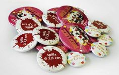 a bunch of buttons that say hello kitty