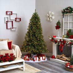 a living room decorated for christmas with presents