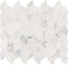 a white marble mosaic tile with wavy lines