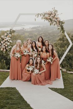 a group of women standing next to each other