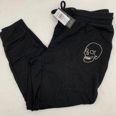 Torrid Black Sweat-Pant New With Tags Skull Embroidered Bin #22 Casual Black Bottoms With Skull Print, Casual Black Skull Print Bottoms, Casual Black Pants With Skull Print, Black Skull Print Bottoms For Fall, White Jogger Pants, Camo Sweatpants, Cargo Leggings, Cropped Sweatpants, White Joggers