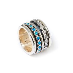 2.2 Carat Blue Opal And White Cubic Zirconia Stones 925 Sterling Silver Spinner Ring Set Setting R-0979-B-S-OPAL-CZCZ Style:Spinner Spinner rings quantity:3 Metal Purity:925 parts per 1000 Main Stone:Doublet Opals Secondary Stone:Cubic Zirconia Total Carat Weight (TCW):2.2 Thickness mm:3 Width mm:14.5 Weight gr.:15.4 Free Shipping: US & CA: 5-7 days UK: 2-3 days Europe: 4-8 days Australia: 10 days Expedited shipping options are also available during checkout process SHOP RISK FREE! * 30 day FREE Sterling Silver Sapphire Rings With Multi-stone, Blue Sterling Silver Jewelry With Channel Set, Blue Sterling Silver Jewelry Channel Set, Blue Sterling Silver Rings With Channel Set, Silver Multi-stone Blue Topaz Rings, Blue Multi-stone Sterling Silver Rings, Silver Blue Topaz Multi-stone Ring, Sterling Silver Sapphire Jewelry With Channel Set, Hammered Silver Ring