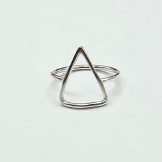 Add some edge to your outfit with our Morgan Triangle ring. Available in all Silver or mixed metal with Gold filled wire. A unique and playful piece that mixes metals for a modern twist. Embrace the triangle and let your style shine with this quirky ring. Featuring a unique Morgan triangle design and mixed metals, this ring is sure to make a statement. Versatile and stylish, it goes with everything! Modern Silver Midi Rings, Modern Silver Metal Midi Rings, Hand Forged Minimalist Metal Rings, Minimalist Hand Forged Metal Rings, Silver Triangle Jewelry For Everyday, Minimalist Silver Pyramid Jewelry, Everyday Triangle Nickel-free Jewelry, Everyday Nickel-free Triangle Jewelry, Sterling Silver Triangle Rings As Gift