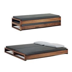 two wooden beds side by side, one with a mattress and the other with a pull out bed