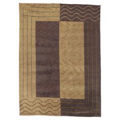 an area rug with different colored squares and wavy lines on the bottom, along with a white background