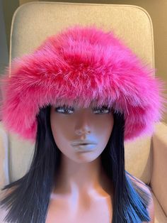 This beautiful incredibly soft faux fur hat is a must have for the fall and winter season.It is stylish and warm and can be dressed up or down. The head circumference of the hat is about 22-23inches (56-60cm) so almost everyone should fit :) The hat is made out of Vegan Fur and is super soft and fluffy:) For any different color requests please send me an email:) Trendy Faux Fur Winter Hat, Trendy Winter Faux Fur Hat, Warm Faux Fur Beanie, Flat Brim Winter Festival Hat, Winter Festival Flat Brim Hat, Trendy Fluffy Winter Hats, Winter Faux Fur Bucket Hat, Pink Brimmed Bucket Hat For Winter, Trendy Brimmed Hat With Faux Fur Lining