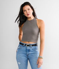 Free People Hayley Racerback Brami - Grey XS/S, Women's Blacksand High neck ribbed stretch brami Bust measures 25 on size XS/S Body length 15 1/4 on size XS/S Model Info: Height: 5'9 | Bust: 33 1/2 | Waist: 25 1/2 | Hip: 35 1/2 | Wearing Size: XS/S. 92% Nylon, 8% Spandex. Machine wash cold, gentle cycle. Non-chlorine bleach. Lay flat to dry.. Measurements: Bust -Fullest part of bust with arms at sides. Waist -Circumference of natural waist: above belly button, below rib cage. Hips -Standing with Trendy Fitted Racerback Crop Top, Fitted Ribbed Racerback Halter Top, Ribbed Fitted Racerback Halter Top, Fitted Ribbed Halter Top With Racerback, Fitted Ribbed Halter Tank Top, Ribbed Fitted Tank Halter Top, Fitted Halter Top For Everyday Wear, Ribbed Fitted Halter Tank Top, Spring Fitted Halter Top