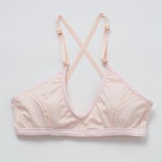 Playful and versatile, this bra is ready for all the adventures your day holds. Wear the convertible straps crossed in back or vertical to accommodate your favorite blouses—or to show off, if you choose. In lightweight, buttery-soft organic cotton. Supports A-C cups. Slip-on style, no back closure. Adjustable, convertible straps with rose gold hardware. Lightweight jersey organic cotton with elastic trim. 94% organic cotton, 6% spandex. Cut and sewn in the U.S. Machine wash and dry. Size Guide Convertible Bra, Rose Gold Hardware, Bra Sizes, You Choose, Gold Hardware, Rose Quartz, Convertible, Size Guide, Slip On