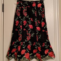 Black With Embroidered Red Rose Skirt Fitted Midi Skirt With Floral Embroidery, Fitted Floral Embroidered Midi Skirt, Red Floral Embroidery Skirt For Spring, Fitted Floral Embroidery Tiered Skirt, Fitted Embroidered Red Skirt, Fitted Red Embroidered Skirt, Fitted Red Skirt With Floral Embroidery, Rose Skirt, Embroidered Skirt