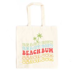 a white bag with the words beach bum written in multicolored letters on it