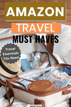 an open suitcase sitting on top of a bed with the words amazon travel must haves