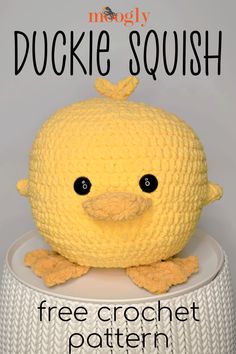 a crocheted stuffed animal sitting on top of a white stool with the words free crochet pattern