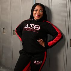 This one of a kind Delta Sigma Theta tracksuit is just what you need for a nice run when it's cold out or for catching a ball game. It is laced with comfort and soft cotton, a hood for extra warmth and a front pocket. Step out in style with this awesome set. FEATURES: Elasticized waistband, with adjustable drawstring. On-seam welt pockets Elasticized cinched-leg openings. Cozy, soft-washed cotton Fits true to size; light stretch Fitted Sporty Tracksuit With Drawstring Hood, Fitted Sportswear Tracksuit With Drawstring Hood, Fitted Tracksuit With Drawstring Hood, Black Hooded Activewear For Sports Events, Sportswear Tracksuit With Hoodie For Sports, Fitted Black Sporty Hoodie, Black Fitted Sporty Hoodie, Fitted Hoodie Tracksuit For Sports, Fitted Sports Tracksuit With Hoodie