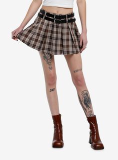 Bring a little bit of that grunge vibe to your pleated skirt rotation with this low-rise style in a brown and beige colorway. It comes with a removable double-strap  faux leather belt.65% polyester; 35% rayonWash cold; dry flatLength: 15"ImportedListed in junior sizesModel is 5'10"Model wear size Small Brown Grunge Bottoms For Fall, Brown Fitted Mini Pleated Skirt, Edgy Brown Bottoms For Fall, Trendy Brown Mini Skirt For Fall, Trendy Brown Fall Mini Skirt, Punk Pleated Mini Skirt For Fall, Edgy Fitted Brown Bottoms, Edgy Brown Fitted Bottoms, Edgy Fall Pleated Mini Skirt