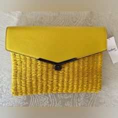 Sunburst Yellow Straw And Leather Clutch With Gunmetal Turn Lock Closure. Use As Clutch Or Crossbody With Included Leather Strap. Dustbag Included. Still In Wrapped Unused Nwt Condition. Spring Satchel With Detachable Strap, Clutch With Adjustable Strap For Shopping, Yellow Evening Bag For Spring, Spring Rectangular Clutch With Adjustable Strap, Rectangular Clutch With Adjustable Strap For Spring, Spring Travel Clutch Bag, Summer Envelope Bag, Spring Clutch Satchel For Daily Use, Spring Clutch Bag With Removable Pouch