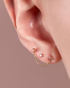 A teeny tiny 14k yellow gold stud with a 1.6mm white diamond. Handmade by Becca Mapes in her Brooklyn, NY studio. – 4-prong setting Sunstone Earrings, White Diamond Earrings, Gold Stud, Beauty Items, Chain Earrings, Gold Studs, Nostril Hoop Ring, Delicate Bracelet, White Diamond