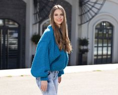 "MATERIAL : 2 strands of 100 % soft wool COLOUR : Blue ( There may be a slight difference because of the different monitors' representation) ♥ In the picture the model is wearing a garment with these measurements : This Sweater is Oversized the measurements are different than the normal ones of our sweaters A: ( Body lenght) : 20 \" / 51 cm B: ( Chest width) : 21.7 \" / 55 cm C: (Sleeve from under the arm) : 20.9 \" / 53 cm They are taken with the item laid flat and not streched. ♥ For choosing Casual Wool Knitted Sweater, Casual Wool Sweater With Knitting Detail, Casual Hand Knitted Sweater For Cold Weather, Casual Merino Wool Knitting Pattern, Casual Chunky Knit Merino Wool Sweater, Oversized Blue Cropped Sweater For Winter, Oversized Blue Chunky Knit Sweater, Cozy Blue Wool Sweater, Blue Chunky Knit Long Sleeve Sweater