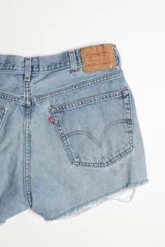 Brand: Levi's Color: Blue Material: Cotton Inseam: 2" Outseam: 13" Leg Opening: 13" Hips: 22" Rise: 12" Waist (flat): 18" Waist: 36" Vintage Condition Notes: - Item is generally in good condition. Like all vintage clothing, it shows some signs of wear, but there are no outstanding flaws. Vintage Denim Shorts, Fisherman Sweater, Vintage Short, Printed Joggers, Blue Denim Shorts, Denim Shorts Women, Vintage Branding, Short En Jean, Vintage Shorts