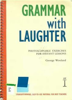 a book with an orange cover and blue squares on the front, which reads'grammar with laughter '