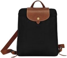 Classic Black Backpack, Classic Travel Accessories With Leather Trim, Classic Black Backpack With Detachable Strap, Classic Backpack With Removable Pouch, Classic Black Bag For Commuting, Black Bag With Leather Trim For Commuting, Classic Black Leather Backpack With Leather Trim, Black Leather Backpack With Leather Trim For Travel, Classic Black Nylon Backpack