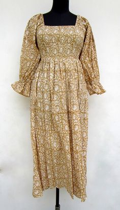 "ITEM DESCRIPTION golden printed cotton long maxi dress - square neckline with smocked maxi dress - long sleeve boho maxi dress Features: Long sleeve, square neck, Long dress Material: Cotton cambric Fabric: 100% cotton soft light weight ethnic print fabrics  Sleeve Length = 22 inch For more sizes & their measurement, please refer our below chart to understand the sizes variations available with us For your size requirement, please mention your size in seller note at the time of buying. SIZE MEASUREMENT  BUSTLENGTHSHOULDER XXS34 inch51 inch13.5 inch XS36 inch51 inch14 inch S38 inch51 inch14.5 inch M40 inch51 inch15 inch L42 inch51 inch16 inch XL44 inch51 inch16.5 inch 2XL46 inch51 inch17 inch 3XL48 inch51 inch18 inch   Company Return Policy:  Please write for more information to my email d Square Neck Long Dress, Long Sleeve Boho Maxi Dress, Ethnic Print, Maxi Dress Cotton, Smocked Dress, Block Printing Fabric, Boho Maxi, Dress Long Sleeve, Boho Maxi Dress