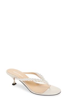 Get ready to say 'I do' to the big-day energy of this gorgeous kitten-heel sandal with imitation pearls embellishing the thong strap. 2" (55mm) heel Leather upper, lining and sole Made in Italy Designer Shoes Bride Glam, White Kitten, Kitten Heel Sandals, Rollerball Perfume, White Kittens, Sandal Shoes, Fancy Shoes, Heel Sandal, Fabric Gift Bags