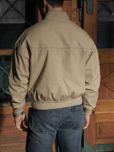 "This classic collegiate-look ivory beige jacket has a soft acrylic knit collar and ribbed cuffs and waistband. The lightweight jacket zips closed in front and closes further with two buttons on the waistband and another at the neckline. The jacket has three stainless steel airing grommets at the back of each underarm seam. Brand label: Hill & Archer (Made in China) Size: 42 to 44 US/UK Material: 65% polyester, 35% cotton Chest = 46 inches (116.84cm) (This is a Size 44 US/UK; the extra space Beige Button-up Outerwear For Daywear, Cheap Beige Double-breasted Outerwear, Vintage Beige Outerwear With Snap Buttons, Beige Double-breasted Solid Outerwear, Vintage Beige Single-breasted Outerwear, Long Overcoat, Brown Tweed, Beige Jacket, Retro Shorts