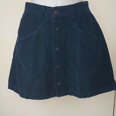 New Free People Cord Mini. Beautiful Ebony Deep Blue Color, Perfect For Fall. Button Down Front And Side Pockets. Never Worn, Tag Came Off When Opened Blue Mini Skirt With Button Zip Fly, Blue Button-up Cotton Skirt, Casual Blue Skirt With Button Zip Fly, Casual Blue Mini Skirt With Button Closure, Blue Button-up Casual Skirt, Blue Short Skirt With Button Closure, Casual Blue Skirt With Button Closure, Trendy Blue Buttoned Skirt, Deep Blue Color