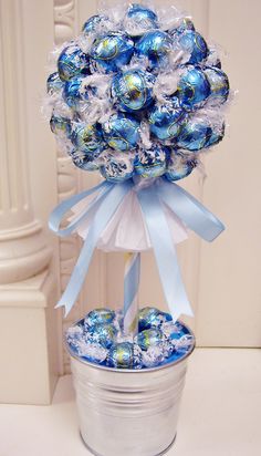 a bucket filled with blue and white candies