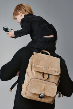 Nicolas Krause and his family star in our 2024 Father’s Day campaign. Suede Backpack, Nylon Travel Bag, Blonde Hair Inspiration, Exclusive Shoes, Black Slip Dress