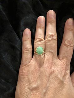 Vintage Solid 14K Yellow Gold Green Jade Heart Design Ring Sz 5 3/4: (In wonderful estate condition) Lovely ring, crafted in solid 14K gold with natural Green Jade and heart shank design, gorgeous! Thank you for your interest and please be sure to see our other listings for more great Jewelry, books and collectables. Want to shop for more items with us here on Etsy? Here is the link: https://www.etsy.com/shop/Shelleyscollectibles?ref=hdr_shop_menu Elegant Green Opal Ring In 14k Gold, Gold Heart Ring With Oval Gemstone, Gold Heart Ring With Gemstone, Elegant Gold Opal Ring For May Birthstone, Classic Green Opal Ring In 14k Gold, Yellow Gold Oval Heart Ring With Gemstone, Heirloom Jade Rings In Yellow Gold, Heirloom Jade Ring In Gold, Heirloom Yellow Gold Jade Rings