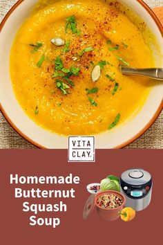 a bowl of butternut squash soup with a spoon in it and the text, vita clay homemade butternut squash soup