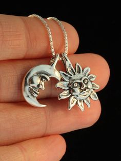 "This unique two part Eclipse Pendant is cast in solid sterling silver. The Moon gently embraces its companion the Sun and they nestle together on the chain. Either charm can also be worn separately, so this design gives you three style variations. The combined pendant is 3/4\" high. Indulge in a piece of our solar system. All Marty Magic Charms and Pendants include an 18 inch (46cm) box chain. If you would prefer a different length of chain please feel free to contact me. This item usually ship Celestial Sun And Moon Sterling Silver Necklace, Celestial Sterling Silver Moon Jewelry, Sterling Silver Sun And Moon Spiritual Necklace, Celestial Moon-shaped Sterling Silver Jewelry, Celestial Moon Shaped Sterling Silver Jewelry, Sterling Silver Spiritual Necklace With Sun And Moon Design, Spiritual Sterling Silver Sun And Moon Necklace, Spiritual Sterling Silver Necklace With Sun And Moon Design, Silver Half Moon Necklace With Sun And Moon Design