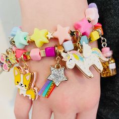 Knock, knock. HUE’s there? Lots of rainbow color and cubes to make the perfect charm bracelet stack! Add charms between the beads of this bracelet and customize her collection! features & materials Base Metal Acrylic 6" length WARNING: Choking Hazard - Small parts. Not for children under 3 years. Bracelet only, charms sold separately Charm Bracelet Stack, Decoupage Tins, Custom Charm Bracelet, Charm It, Bottle Charms, Kawaii Jewelry, Bead Charm Bracelet, Framed Gifts, Toy Sale